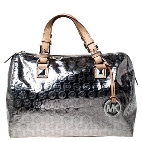 michael kors silver purses.